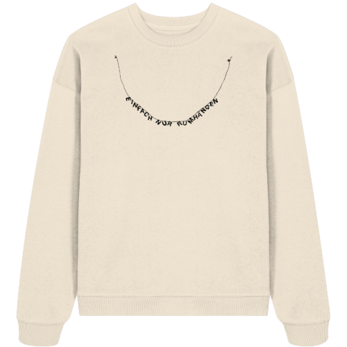 der in kettenform gestaltete schriftzug: einfach nur rumhängen auf einem oversize sweatshirt